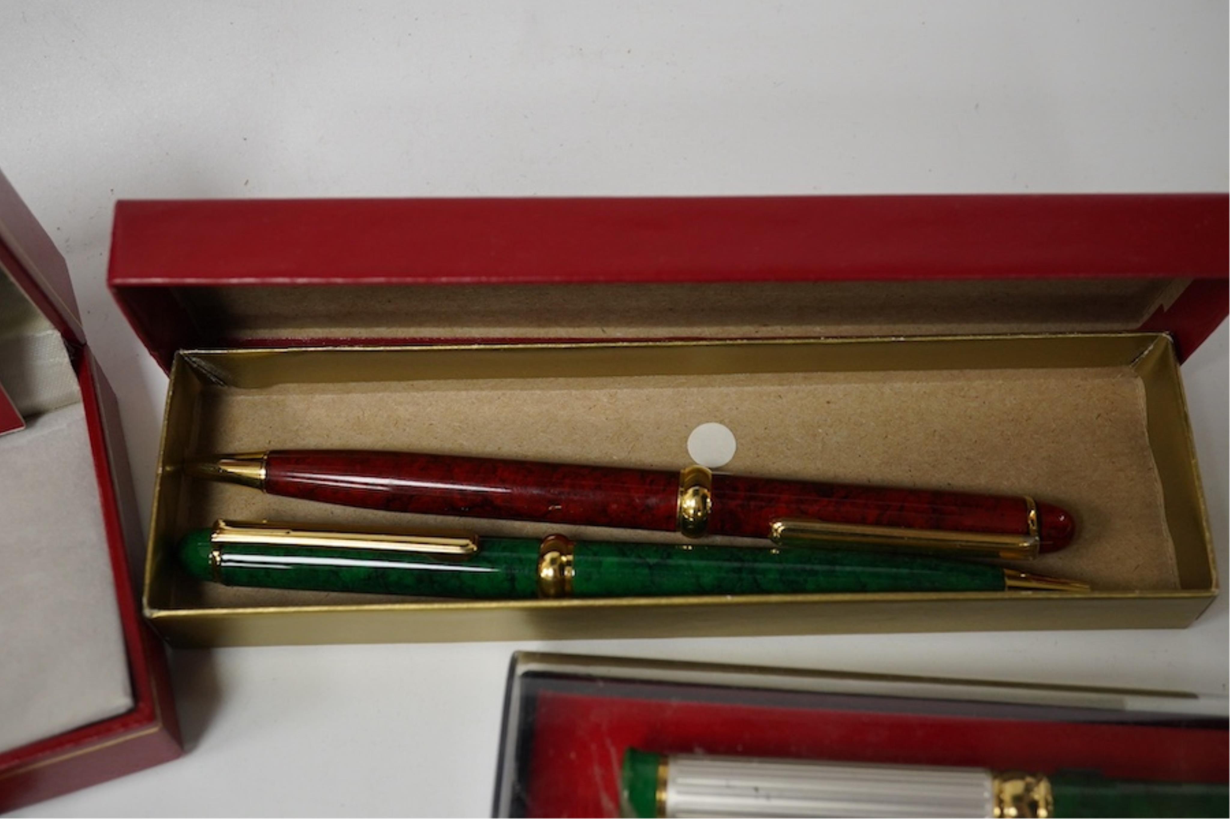 A collection of various pens, a ladies Must de Cartier wrist watch and a H.N. Ansell medal. Condition - varies